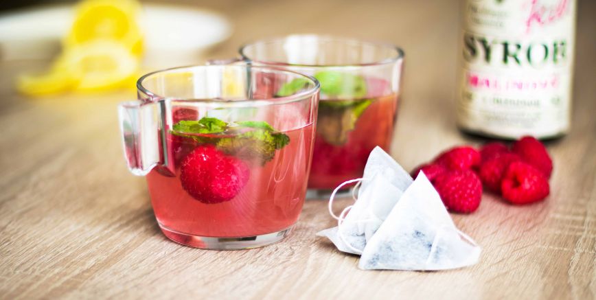 Raspberry ice tea with raspberry syrup